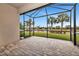 Spacious screened patio overlooking a peaceful lake at 13836 Alafaya St, Venice, FL 34293