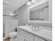 Bright bathroom featuring a walk-in shower and modern vanity at 1555 Tarpon Center Dr # 238, Venice, FL 34285
