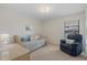 Bedroom with daybed, comfortable seating and window views at 1700 Curry Ave # 37, Nokomis, FL 34275