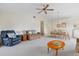 Combined living and dining area with seating for six and a view to the outside at 1700 Curry Ave # 37, Nokomis, FL 34275