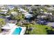 Community pool and surrounding homes visible from above at 18 Oakwood N Dr # 18, Englewood, FL 34223