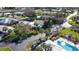 Aerial view showcasing community, pool, and landscaping at 18 Oakwood N Dr # 18, Englewood, FL 34223