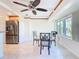 Bright kitchen features stainless steel appliances and a breakfast nook at 18 Oakwood N Dr # 18, Englewood, FL 34223