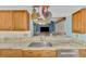 Modern kitchen with stainless steel appliances and granite countertops at 1815 Killdeer Ct, Venice, FL 34293