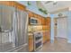 Updated kitchen, featuring stainless steel appliances and granite countertops at 1815 Killdeer Ct, Venice, FL 34293