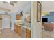 Clean kitchen with stainless steel appliances and granite countertops at 1815 Killdeer Ct, Venice, FL 34293