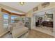 Bright sunroom overlooking pool and backyard at 1815 Killdeer Ct, Venice, FL 34293