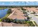 Aerial view of community featuring several tan houses at 1891 San Silvestro Dr, Venice, FL 34285