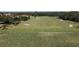 Aerial view of a golf course driving range at 1891 San Silvestro Dr, Venice, FL 34285