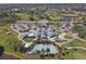 Aerial view of community pool and clubhouse at 1891 San Silvestro Dr, Venice, FL 34285