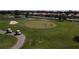 Golf course putting green with players at 1891 San Silvestro Dr, Venice, FL 34285