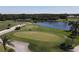 Golf course with putting green and lake at 1891 San Silvestro Dr, Venice, FL 34285