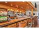 Well-equipped bar with various liquors and seating at 1891 San Silvestro Dr, Venice, FL 34285