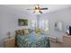 Bedroom with a double bed and ceiling fan at 1891 San Silvestro Dr, Venice, FL 34285
