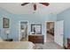 Bedroom with ensuite bathroom and a view of the living room at 1891 San Silvestro Dr, Venice, FL 34285