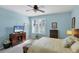 Bedroom with a double bed, large window, and ceiling fan at 1891 San Silvestro Dr, Venice, FL 34285