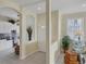 Welcoming entryway with view of the living room and kitchen at 1891 San Silvestro Dr, Venice, FL 34285