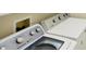 Laundry room with a washer and dryer at 1891 San Silvestro Dr, Venice, FL 34285