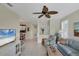 Bright and airy living room with comfortable seating and plenty of natural light at 1891 San Silvestro Dr, Venice, FL 34285