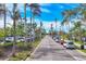 Scenic street view with palm trees at 1891 San Silvestro Dr, Venice, FL 34285