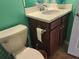Bathroom with single vanity and toilet at 19010 Mangieri St, Venice, FL 34293
