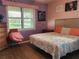 Bedroom with king-size bed and tranquil decor at 19010 Mangieri St, Venice, FL 34293