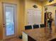 Kitchen with granite countertop and access to the patio at 19010 Mangieri St, Venice, FL 34293