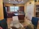 Bright kitchen features an island, stainless steel appliances, and plenty of cabinet space at 19010 Mangieri St, Venice, FL 34293