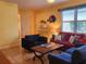 Living room with comfy seating and colorful decor at 19010 Mangieri St, Venice, FL 34293