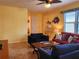 Living room with comfy seating and colorful decor at 19010 Mangieri St, Venice, FL 34293
