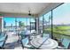 Enjoy resort-style living with this screened-in community patio overlooking the pool and expansive green spaces at 19500 Petrino St, Venice, FL 34293