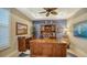 Bright home office features built-ins and wood furnishings at 19500 Petrino St, Venice, FL 34293