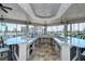 Large outdoor kitchen with granite countertops and bar seating at 19500 Petrino St, Venice, FL 34293
