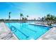 Resort-style pool with plenty of lounge chairs for relaxing at 19500 Petrino St, Venice, FL 34293