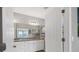 Elegant bathroom with granite countertops and updated fixtures at 19807 Bridgetown Loop, Venice, FL 34293