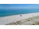Aerial view of beach with people and volleyball net at 19807 Bridgetown Loop, Venice, FL 34293