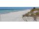 Expansive beach with white sand and turquoise water at 19807 Bridgetown Loop, Venice, FL 34293
