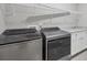 Spacious laundry room with Whirlpool washer and dryer at 19807 Bridgetown Loop, Venice, FL 34293