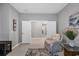 Open and airy living room with access to other rooms at 19807 Bridgetown Loop, Venice, FL 34293