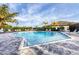 Inviting community pool with plenty of lounge chairs at 19807 Bridgetown Loop, Venice, FL 34293