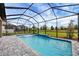 Inviting screened pool with spacious patio area, perfect for relaxation at 19807 Bridgetown Loop, Venice, FL 34293