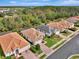 Community overview showcasing several homes with similar architectural styles at 2136 Mesic Hammock Way, Venice, FL 34292