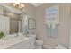 Clean bathroom with updated vanity and shower at 2136 Mesic Hammock Way, Venice, FL 34292