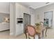 Kitchen with white cabinets, stainless steel appliances, and breakfast area at 2136 Mesic Hammock Way, Venice, FL 34292