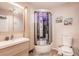 Modern bathroom with a large walk-in shower and updated vanity at 2280 Stickney Point Rd # 437, Sarasota, FL 34231