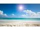 Scenic beach view with white sand and blue water at 2280 Stickney Point Rd # 437, Sarasota, FL 34231