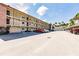 Two story building with parking in front at 2280 Stickney Point Rd # 437, Sarasota, FL 34231