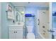 Clean bathroom with a shower/tub combo and white vanity at 232 Saint Augustine Ave # 105, Venice, FL 34285
