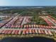 Aerial view showing home location in a community by the lake at 232 Teramo Way, Nokomis, FL 34275