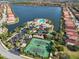 Community features: pool, tennis courts, and clubhouse at 232 Teramo Way, Nokomis, FL 34275